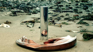 Anamorphic sculptures reveal their secret shapes in the mirror